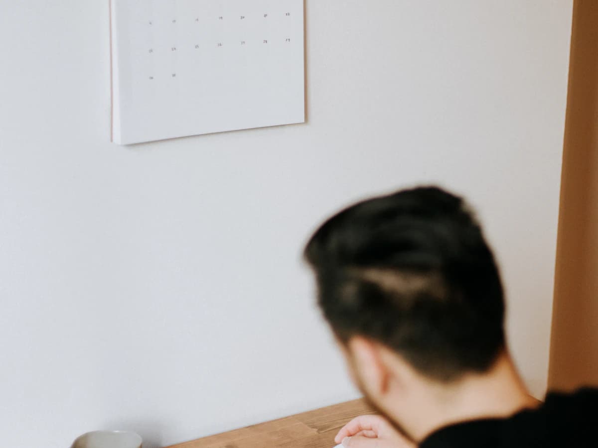 Illustrative photograph of a professional working at a desk